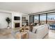 Inviting living room with fireplace, balcony views, and comfortable seating arrangements at 7175 E Camelback Rd # 510, Scottsdale, AZ 85251