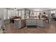Island kitchen with stainless appliances, granite counters and an eat-in kitchen at 7242 W Aurora Dr, Glendale, AZ 85308