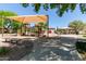 Shaded playground, picnic tables and benches, perfect for recreation and gatherings at 7242 W Aurora Dr, Glendale, AZ 85308