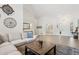 Open-concept living room with comfortable seating, stylish decor, and a view of other rooms at 7508 E Aster Dr, Scottsdale, AZ 85260