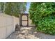 Backyard shed with fresh wood and mature landscaping provides an outdoor storage solution at 7508 E Aster Dr, Scottsdale, AZ 85260