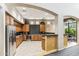 Spacious kitchen featuring ample cabinets, granite countertops, and stainless steel appliances at 7601 E Indian Bend Rd # 3002, Scottsdale, AZ 85250