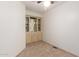 Cozy dining room featuring carpet flooring, and built-in cabinets for storage at 8337 E Desert Trl, Mesa, AZ 85208