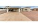 Charming single-story home with a covered carport and well-maintained landscaping at 8337 E Desert Trl, Mesa, AZ 85208