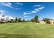 Well-manicured golf course, offering lush green fairways and a serene landscape at 8337 E Desert Trl, Mesa, AZ 85208