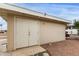 Exterior storage shed with double doors, providing ample space for tools and equipment at 8337 E Desert Trl, Mesa, AZ 85208