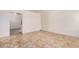 Spacious living room featuring tile floors and neutral walls, awaiting your personal touch at 870 S Palm Ln # 55, Chandler, AZ 85225