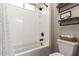 Clean bathroom features a shower/tub and shelves for storage at 9281 W Villa Chula --, Peoria, AZ 85383