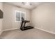 Bright bedroom features plantation shutters and ceiling fan at 9281 W Villa Chula --, Peoria, AZ 85383