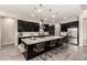 Well-equipped kitchen with a large island, modern finishes, and stainless steel appliances at 9281 W Villa Chula --, Peoria, AZ 85383