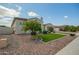 Side view of a home showing gravel landscaping and a small lawn at 9281 W Villa Chula --, Peoria, AZ 85383