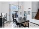 Bright dining room with modern chandelier and large windows at 1215 W Wahalla W Ln, Phoenix, AZ 85027