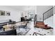 Bright, open-concept living area with high ceilings and elegant tile flooring at 1215 W Wahalla W Ln, Phoenix, AZ 85027