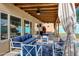 Cozy covered patio with comfortable seating, perfect for relaxing and enjoying the outdoor space at 1215 W Wahalla W Ln, Phoenix, AZ 85027