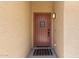 Front door features a window and decorative design at 14208 W Larkspur Dr, Surprise, AZ 85379