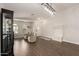 Open-concept living room with modern décor, and stylish furnishings at 14208 W Larkspur Dr, Surprise, AZ 85379