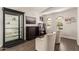 Bright living room with a display cabinet, and clerestory windows at 14208 W Larkspur Dr, Surprise, AZ 85379