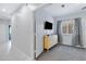 Bright bedroom with a dresser, TV, ceiling fan, and ample space; neutral tones make it a versatile retreat at 14801 S 8Th St, Phoenix, AZ 85048