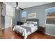 Spacious main bedroom boasts a modern fan and a calming color palette at 14801 S 8Th St, Phoenix, AZ 85048