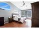 Serene main bedroom with high ceilings, ample natural light, and modern fan at 14801 S 8Th St, Phoenix, AZ 85048