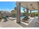 Outdoor patio with lounge seating overlooking a refreshing pool, perfect for relaxing or entertaining with a resort feel at 14801 S 8Th St, Phoenix, AZ 85048