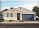 Charming single-story home with neutral stucco exterior, stone accents, landscaped front yard and a two-car garage at 150 N 175Th Ave, Goodyear, AZ 85338