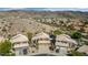Scenic aerial view of a neighborhood with custom homes, manicured landscaping, and stunning mountain views at 15020 S 25Th St, Phoenix, AZ 85048