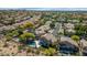Elevated perspective of a residential area featuring spacious homes, private pools, and mature trees at 15020 S 25Th St, Phoenix, AZ 85048