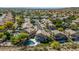 Aerial view of a suburban neighborhood with well-manicured homes, private pools, and lush landscaping at 15020 S 25Th St, Phoenix, AZ 85048