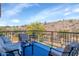 Relaxing balcony seating area overlooking desert views and black metal railings at 15020 S 25Th St, Phoenix, AZ 85048