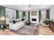 Cozy living room with a fireplace, large windows, and comfortable seating at 15020 S 25Th St, Phoenix, AZ 85048
