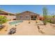 Desert backyard featuring a pool and drought resistant plants at 15107 E Desert Willow Dr, Fountain Hills, AZ 85268
