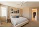 Bright main bedroom with large windows, cozy furniture, and decorative touches at 15107 E Desert Willow Dr, Fountain Hills, AZ 85268