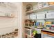 Organized pantry featuring wire racks and a variety of storage containers at 15107 E Desert Willow Dr, Fountain Hills, AZ 85268