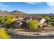 Expansive home boasts lush landscaping, a tile roof, and stunning mountain views in a desert setting at 1713 W Calle Marita --, Phoenix, AZ 85085