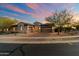 Inviting single-story home with a three-car garage, desert landscaping, and a paver driveway at 1713 W Calle Marita --, Phoenix, AZ 85085