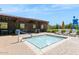 Inviting hot tub and lounge area with chairs and a covered picnic area at 1713 W Calle Marita --, Phoenix, AZ 85085