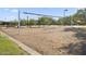 Sand volleyball court with net and seating area at 1713 W Calle Marita --, Phoenix, AZ 85085