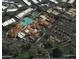 Aerial view showcasing the community pool, clubhouse, parking area, and surrounding residences at 17162 N Winding Trl, Surprise, AZ 85374