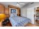 Bedroom features a Murphy bed, built-in shelving and desk area, maximizing space and functionality at 17162 N Winding Trl, Surprise, AZ 85374