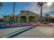 Community center featuring manicured landscaping, a grand entrance, and convenient parking at 17162 N Winding Trl, Surprise, AZ 85374