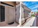 Exterior view showcasing the front door and stucco facade at 17162 N Winding Trl, Surprise, AZ 85374