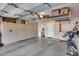 Spacious garage with built-in storage cabinets and overhead shelving at 17162 N Winding Trl, Surprise, AZ 85374