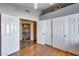 Hallway view featuring ample storage with built-in cabinets and shelving for organized living at 17162 N Winding Trl, Surprise, AZ 85374