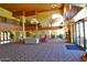 Bright lobby featuring high ceilings, a comfortable seating area, and elegant lighting at 17162 N Winding Trl, Surprise, AZ 85374