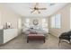 Serene main bedroom suite featuring modern furnishings, and ample natural light at 17425 W Willow Ave, Surprise, AZ 85388