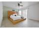 Serene main bedroom with modern platform bed, and natural light, creating a relaxing retreat at 1810 N Sunaire Cir, Mesa, AZ 85205