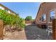 Spacious backyard with gravel landscaping and barbecue grill, perfect for outdoor entertaining at 18492 E Oak Hill Ln, Queen Creek, AZ 85142