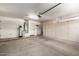 Spacious garage with ample storage cabinets and plenty of room for parking at 18492 E Oak Hill Ln, Queen Creek, AZ 85142