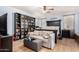 Spacious main bedroom with built-in shelves, ceiling fan and ample natural light at 18492 E Oak Hill Ln, Queen Creek, AZ 85142